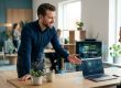 En IT-konsulent peger på en bærbar computer i et lyst kontor med netværksudstyr.